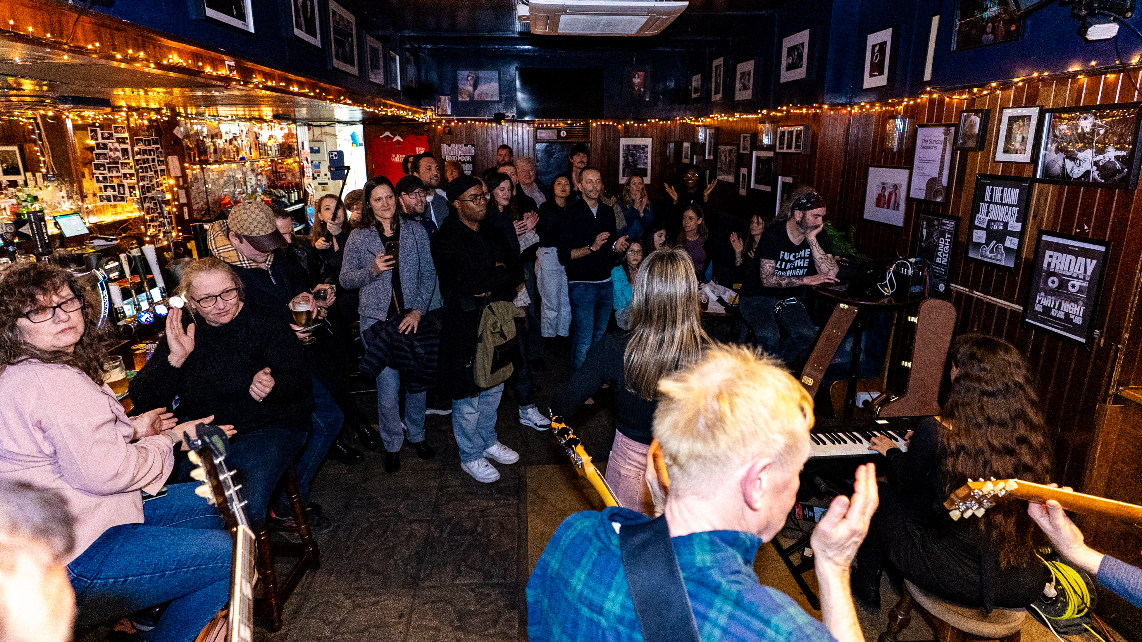Band performing live on stage in London